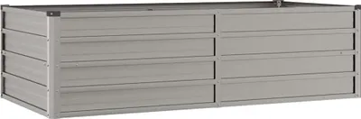 A rectangular, raised garden bed made of gray metal panels.
