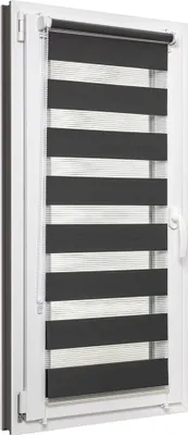 A roller blind with alternating dark gray and white stripes, installed on a white window frame.