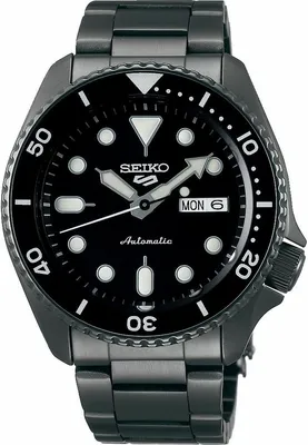 A close-up studio shot of a black Seiko 5 automatic watch.