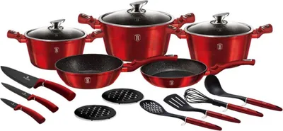 A set of red cookware and knives arranged on a white background.