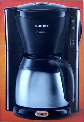 A black Philips coffee maker with a silver carafe sits against an orange and light gray background.