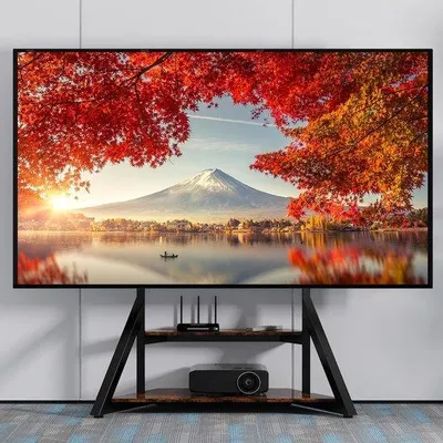 Immagine prodotto di Uniqoos®: Base regolabile per TV con 2 ripiani per dispositivi AV, compatibile con televisori da 65 a 100 pollici, standard VESA, altezza regolabile da 138 a 168 mm, capacità di carico: 100 kg