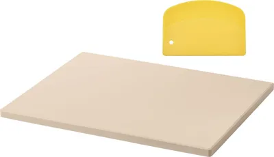 A pizza stone and a yellow dough scraper are shown on a white background.