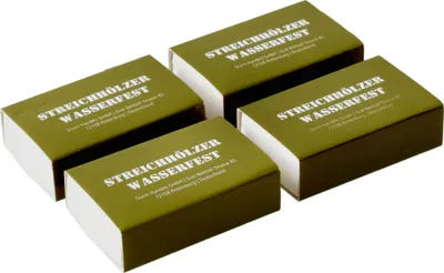 Four packages of waterproof matches are arranged diagonally on a white background.
