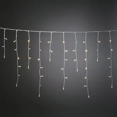 Obrázok produktu pre Konstsmide Svetelná clona LED Ice Rain, so svetelným senzorom a časovačom na 6h a 9h, matná, 80 teplých bielych diód, napájaná batériami, vonkajšia (IP44), biely kábel, batérie: 2 x D 1,5V (bez) - 3739-132