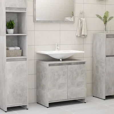 A clean and modern bathroom vanity with a sink and storage cabinets.
