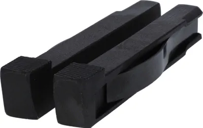 Two black bench dogs for woodworking.