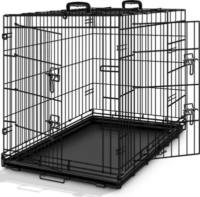 A black metal dog crate with its front door open, shown on a white background.