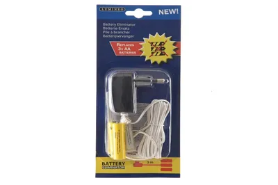 A product package for a battery eliminator, showing the product inside.