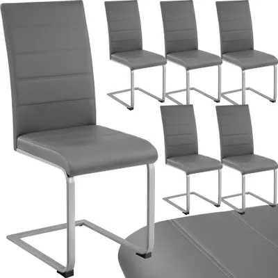 A set of four gray dining chairs with chrome legs are arranged on a white background. One chair is in the foreground, and three are in the background.