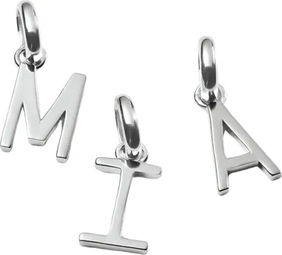 Three silver alphabet charms are displayed against a white background.