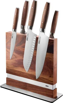 A set of kitchen knives in a wooden magnetic block.