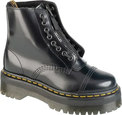 A black Dr. Martens boot with a platform sole and zipper closure.