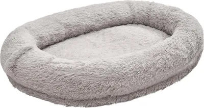 A gray, oval-shaped pet bed with raised sides, shown from a diagonal angle on a white background.