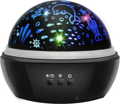 A black night sky projector with a dome displaying a marine-themed projection.