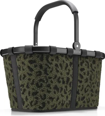 A studio shot of a shopping basket with a leopard print pattern.