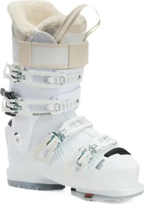 A white ski boot with beige accents and a white sole, shown from the side against a white background.