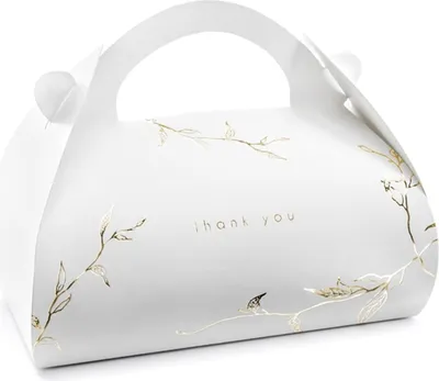 A white gift box with gold floral accents and the text "thank you".