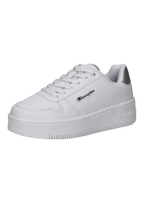 A white Champion sneaker with silver accents is shown against a white background.