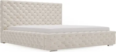 A beige upholstered bed frame with a tufted headboard and footboard, shown with a white mattress.