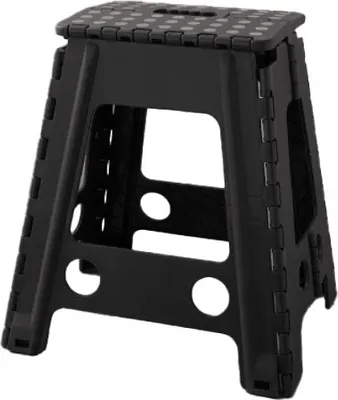A black folding stool is shown against a white background.