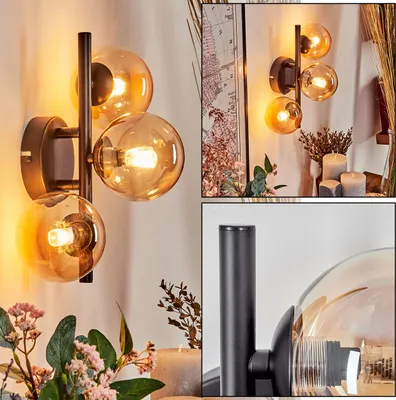 Produktbild von Isorella Wandlampe aus Metall/Riffelglas in Schwarz/Bernsteinfarben