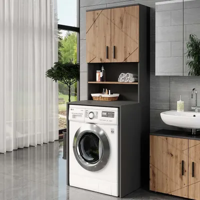 A modern laundry room with a washing machine, a cabinet unit, and a sink.