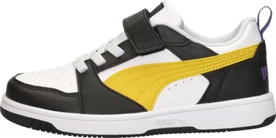 A side view of a single Puma Rebound PS Jungen Klettschuh.