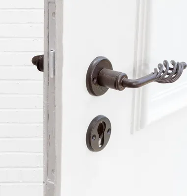 Produktbild von Drückergarnitur für Haustüren, Rustikales Design | PZ | Eisen braun