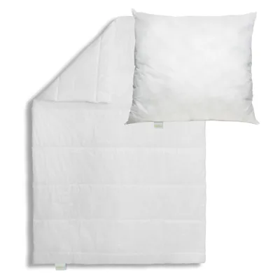A white duvet and pillow are laid out on a white background.