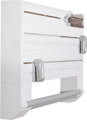 A white wall-mounted dispenser for kitchen rolls and foil.