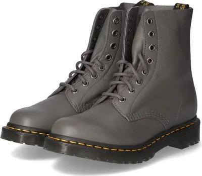 A pair of gray Dr. Martens boots.