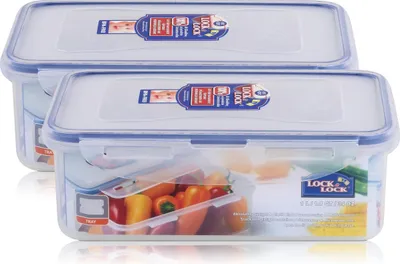 Two Lock&Lock food storage containers are shown, one stacked on top of the other. The front container is partially open, revealing colorful mini bell peppers inside. The containers have blue lids and clear bodies.