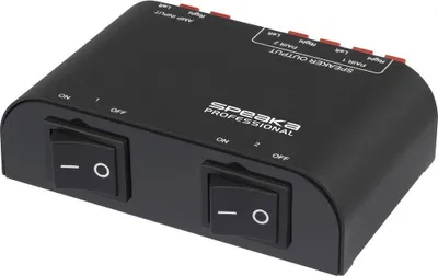 A black SpeaKa Professional speaker switch with two toggle switches on the front.
