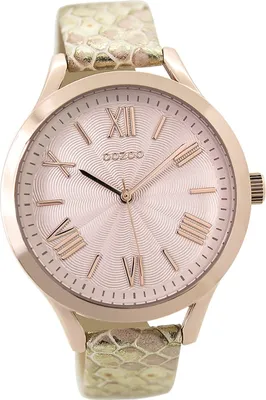 A close-up studio shot of a women's wristwatch.