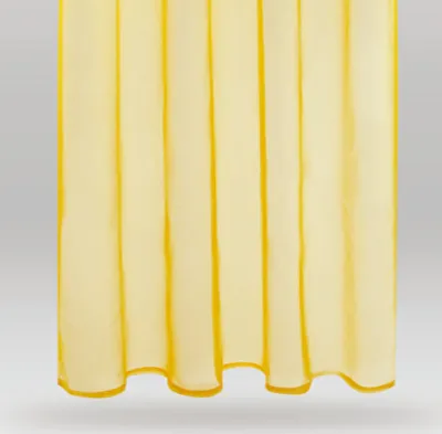 A close-up view of a yellow curtain with vertical pleats.