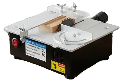 Immagine prodotto di Mini sega da banco, potenza 96W, velocità 5000 giri/min, regolazione dell'altezza della lama da 0,1 a 15 mm, design orizzontale, adatta per il taglio di legno e acrilico