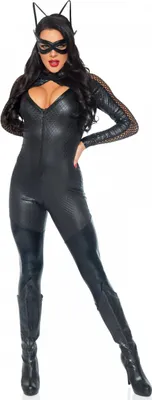 A woman in a cat costume posing against a white background.