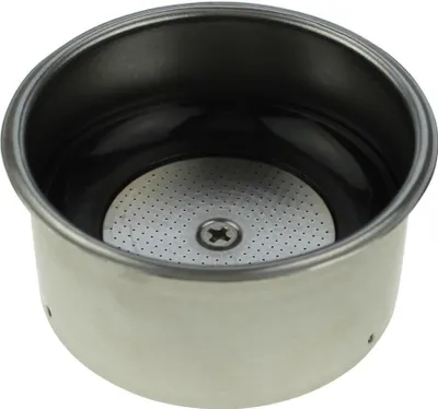 Close-up view of the inside of a coffee machine filter basket.