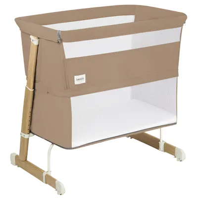 A baby crib/bed with wooden legs and beige fabric sides with mesh windows.