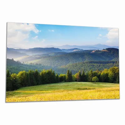Produktbild von Wallario Herdabdeckplatte aus Glas, Größe 80 x 52 cm 1-teilig, Motiv Berglandschaft im Gebirge unter blauem Himmel