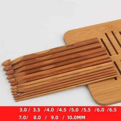Immagine prodotto di Set di 12 ferri con manici in bambù e legno, da 3 a 10 mm, per lavorare a maglia e per lavori manuali.