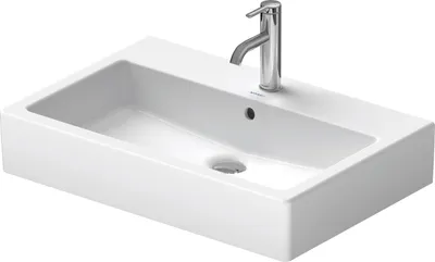 A white ceramic sink with a chrome faucet, shown from a diagonal angle against a white background.