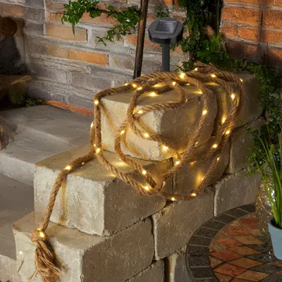 Produktbild von esotec-gmbh Solar Lichterkette Jute warmweiß, 60 LEDs mit Dauer- & Blinklicht, 4,5m Seillänge, 18mm Durchmesser, 2m Zuleitung