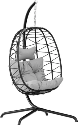 A hanging egg chair with a stand and cushions, presented on a white background.
