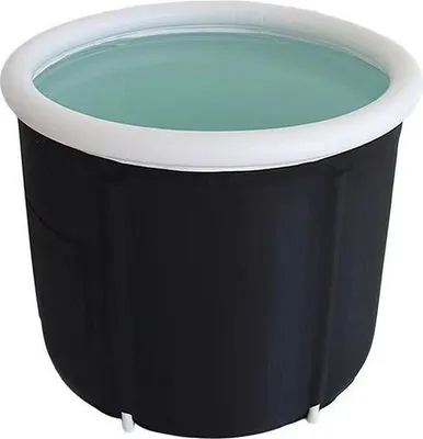A black inflatable bathtub filled with water.
