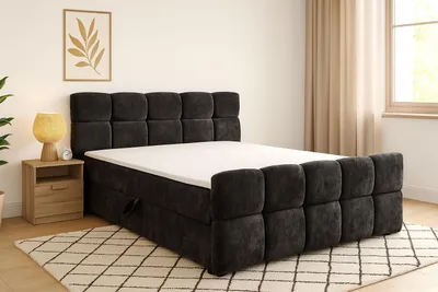 A bedroom scene with a bed, nightstand, and artwork.