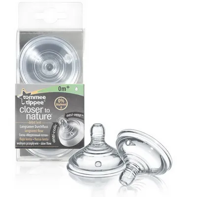 A product shot of Tommee Tippee Closer to Nature baby bottle teats in their packaging, with two teats shown outside the packaging.