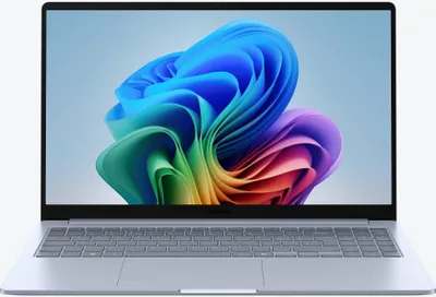 A laptop is shown from the front, open, displaying its screen and keyboard.