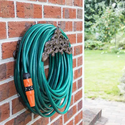 Produktbild von HI Schlauchhalter aus Gusseisen Braun